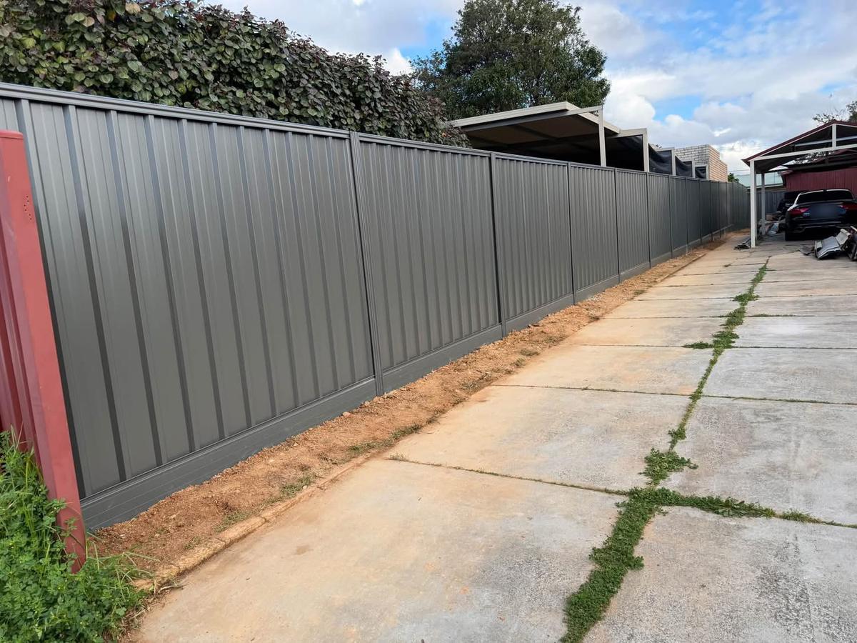 New Colorbond fence that replaced an old asbestos fence