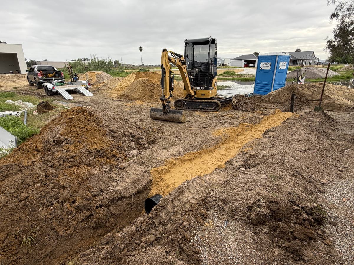 Drainage trench and pipe on a new home site