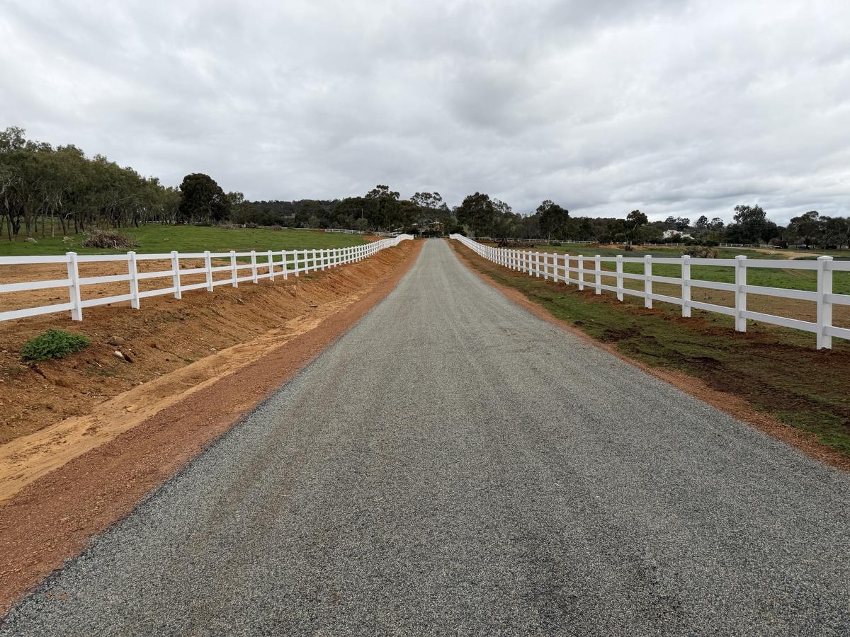 PVC post and rail driveway fencing